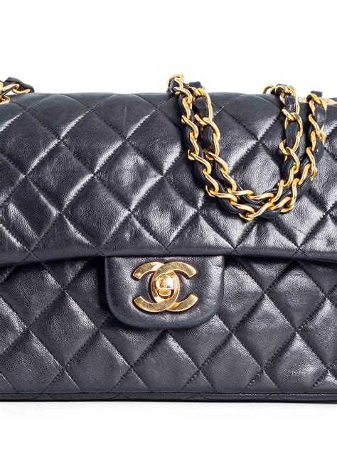 chanel black classic quilted mini 2.55 flap bag